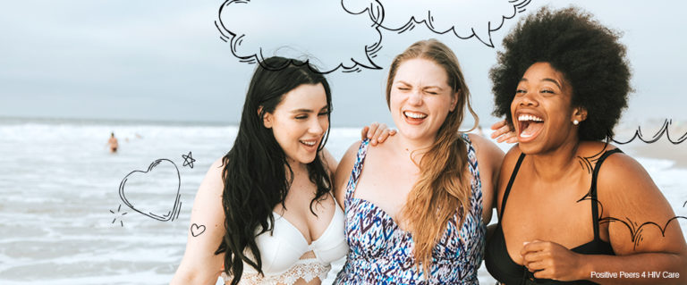 Picture of three women smiling and hugging on the beach